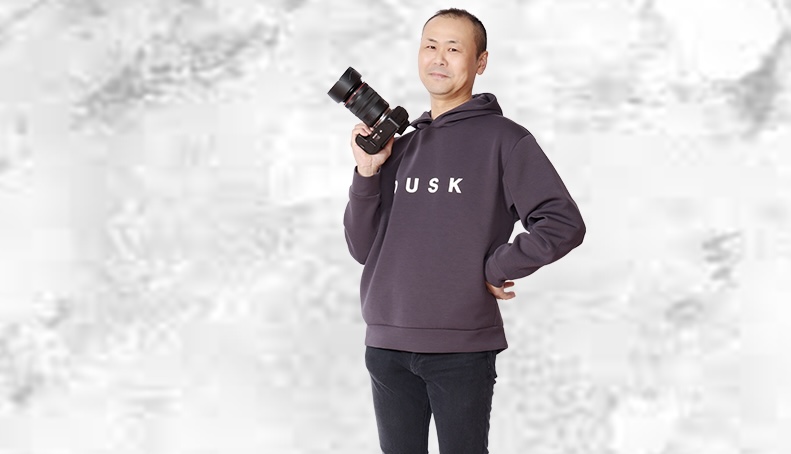 フォトグラファー吉村章雄さん本人